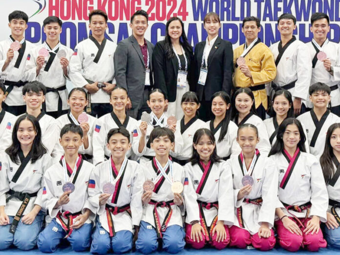 WELL DONE: Members of the Smart/MVPSF Philippine taekwondo pose after the 2024 World Taekwondo Poomsae Championships in Hong Kong, winning two silver and eight bronze medals.